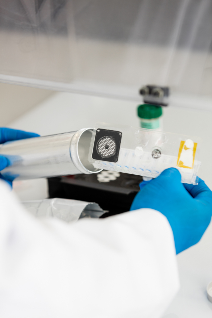 Person holding a BioFire® syndromic pouch.